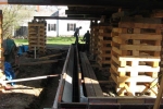 New concrete footing poured with new concrete frost walls formed