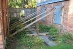 Melodeon Factory with supports, before restoration