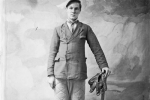 Young Man with baseball equipment