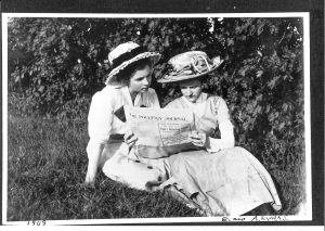 Photograph of E. & A. Evans reading an issue of The Poultney Journal, 1909 
Poultney Historical Society Collections